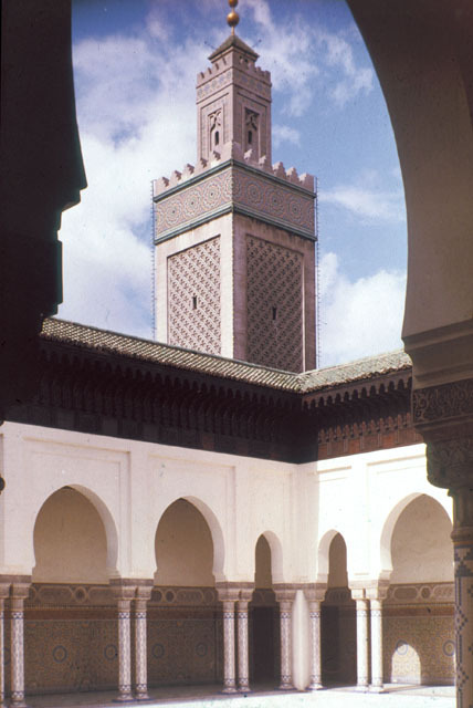 View looking northweast across the courtyard, with minaret seen rising behind the arcade