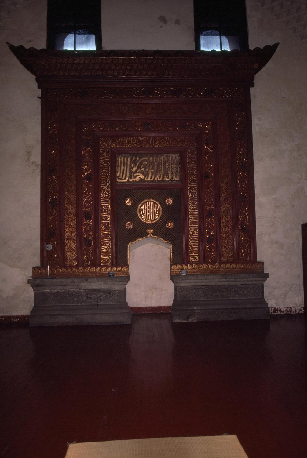 Mihrab inside the original prayer hall with corbelled crown