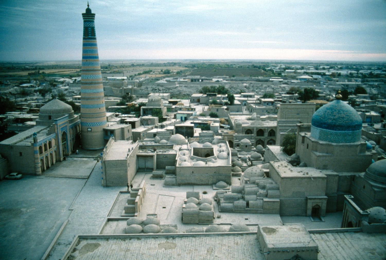 Exterior aerial view from minaret of Masjid-i Juma showing dome on right and minaret on left