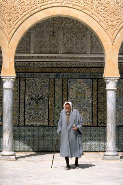 Man in the zawiya courtyard