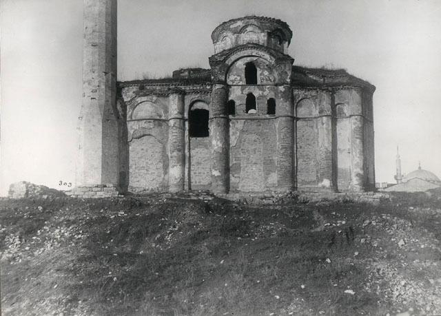 Exterior view from south after 1911 fire, the lower windows have been filled in with masonry