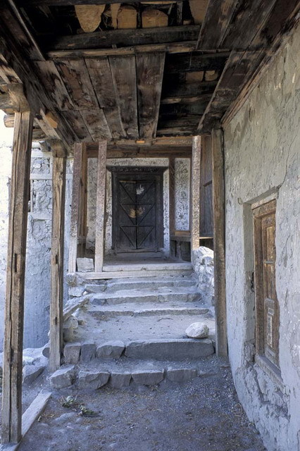 Khaplu Palace Restoration - Northern entrance to fort, before restoration, as seen from portico of adjoining building