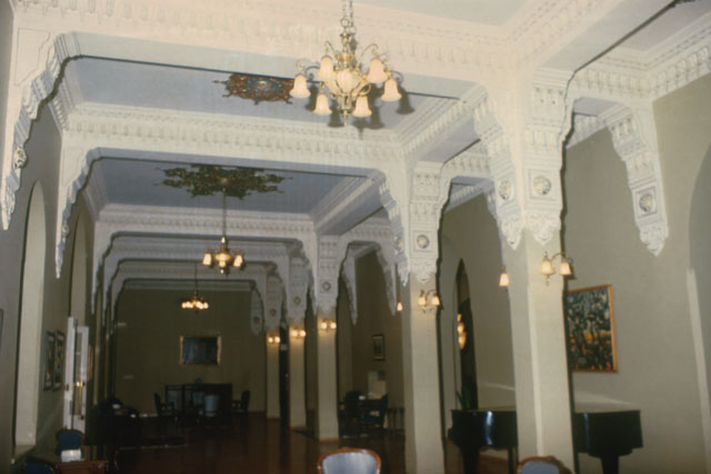Interior view showing elaborate carved moldings