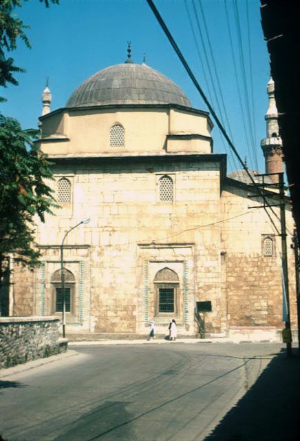 Exterior view from southeast looking towards the qibla wall, showing the dome of the prayer hall