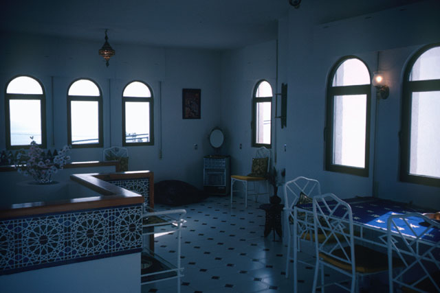 Interior detail showing window lined dining room