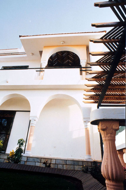 Exterior detail showing carved plaster decoration and woodwork