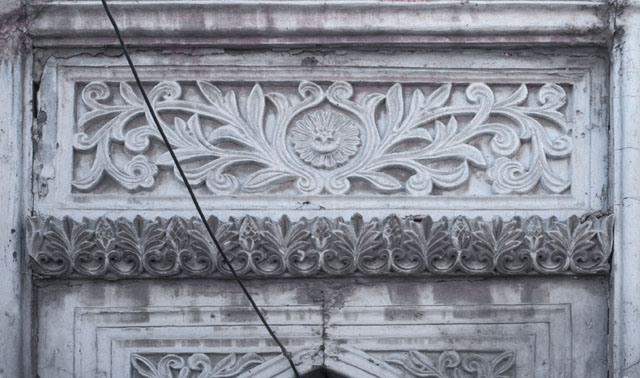 Detail of marble carving above an internal door