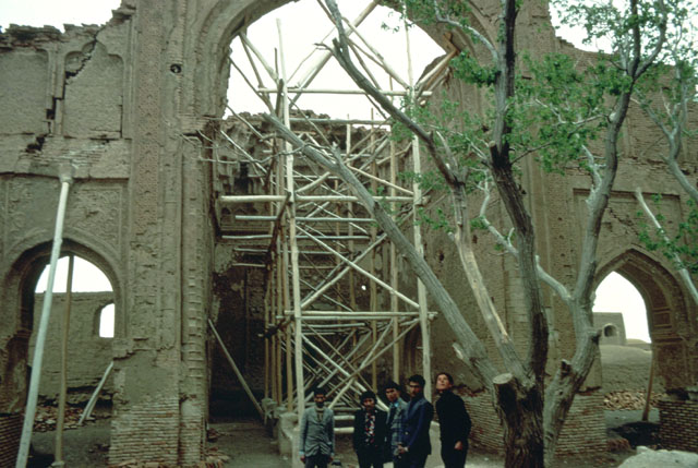Courtyard view of main iwan, with collapsed vault