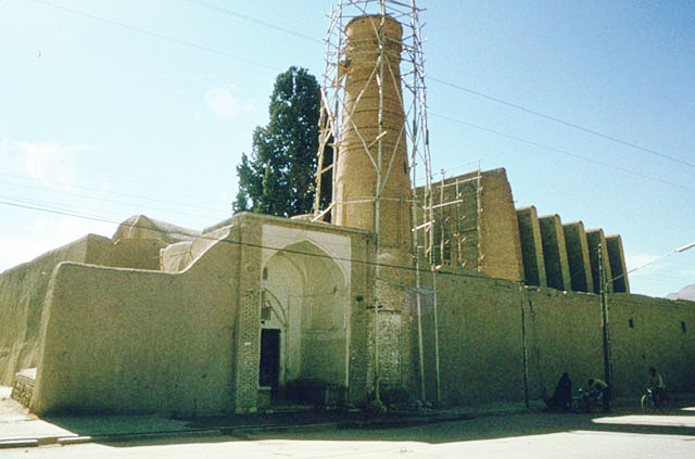 Exterior view from north, with portal and minaret