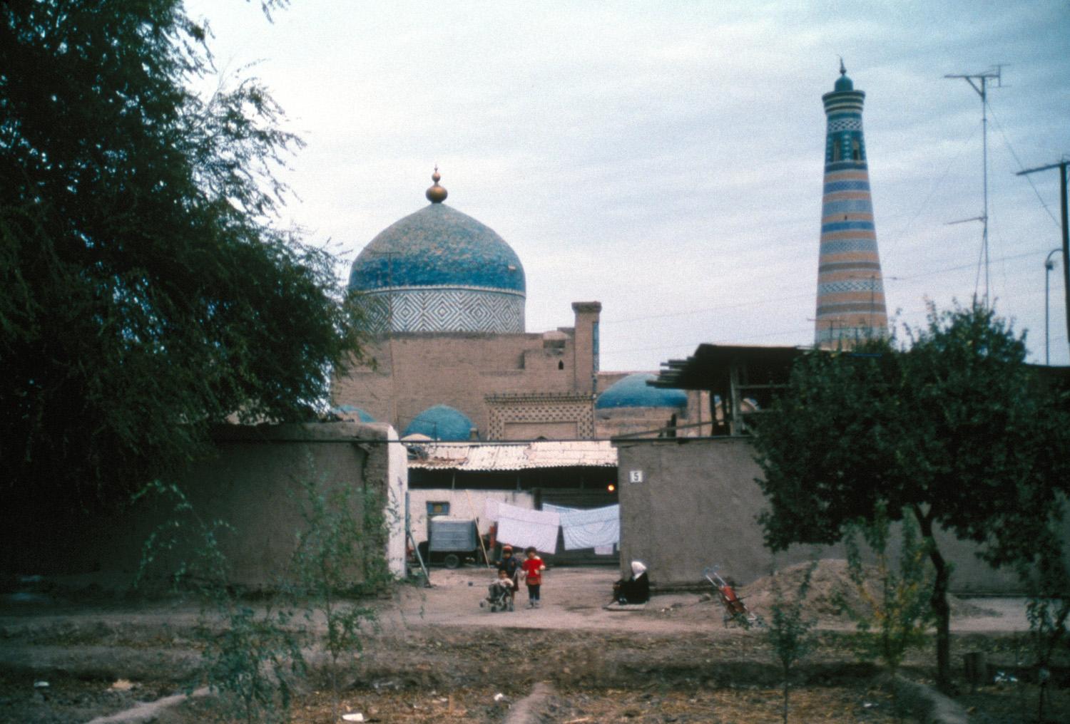 Exterior view of the khanagah, with the minaret of the Islam Hodja Madrasa in the background