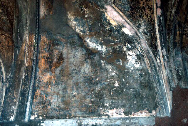 Interior view of east gate; female saint and unidentified figure on interior northwest spandrel