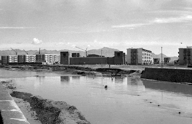 General view of the housing project, under construction, with Kabul river in the foreground