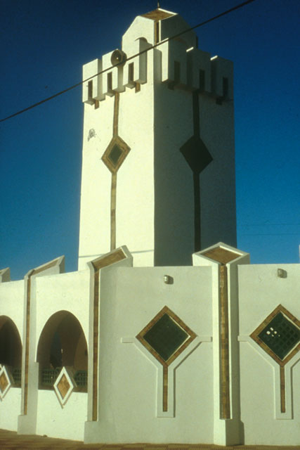 Exterior detail showing decorative treatments on minaret and façade