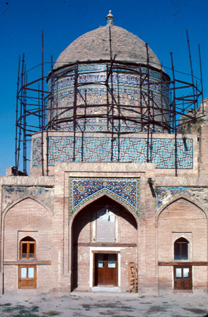Khanqah-i 'Abdi Birun - View of the side façade showing the dome and drum under repair