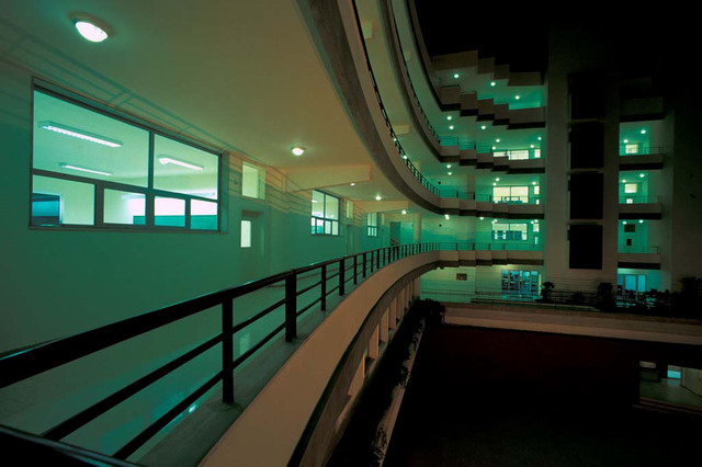 Night view of central courtyard enveloped by corridors