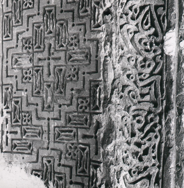 Detail of mihrab, carvings on inner surface of niche and inscriptive border of niche arch
