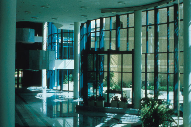 Interior view showing dramatic curved glazing of entrance
