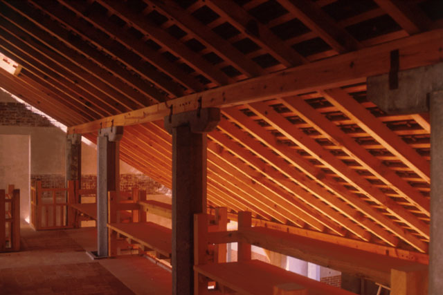 Interior detail showing wood beam roof construction