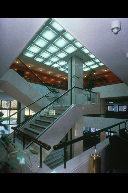 Interior view showing use of glass and steps to effect a dynamic space