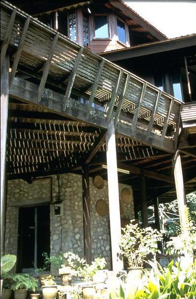 Timber balcony and stone stairwell core