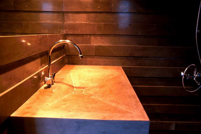 Stone bathroom sink the surface is inclined towards the centre to give a depth of three centimetres