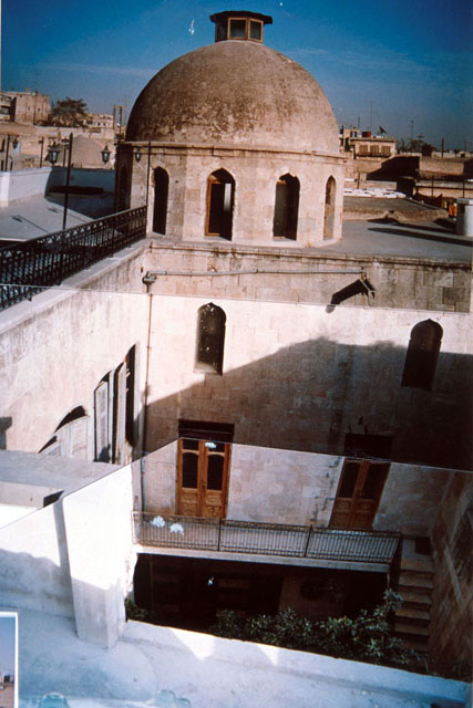 Exterior view showing cupola and rim of central courtyard
