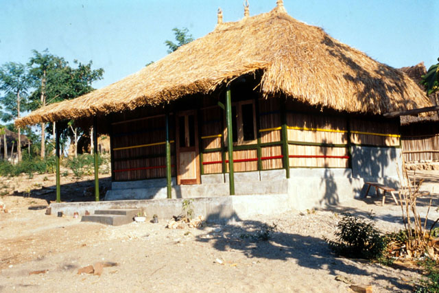 Exterior view of entrance to thatch buildings