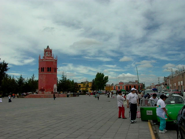 General exterior view of plaza with clock tower at its center