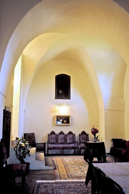 Interior view of vaulted living room with furniture