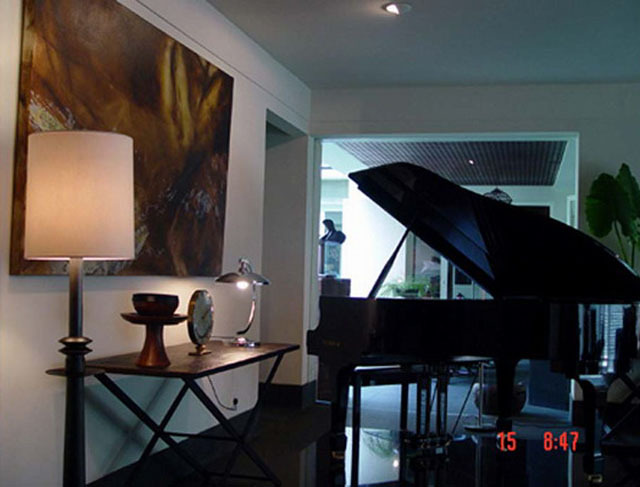Interior view, living room with piano