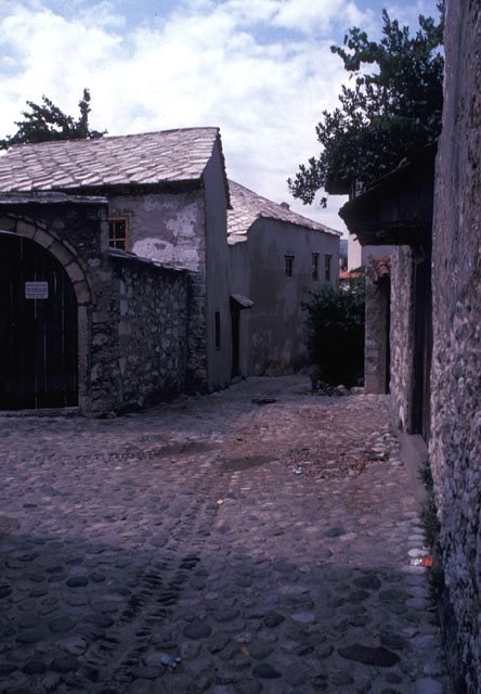 Street view in the old city with the entrance to the Biscevica House Museum on the left
