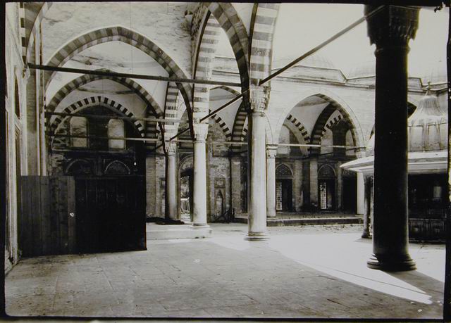 View of mosque courtyard, looking southwest from southeast arcade