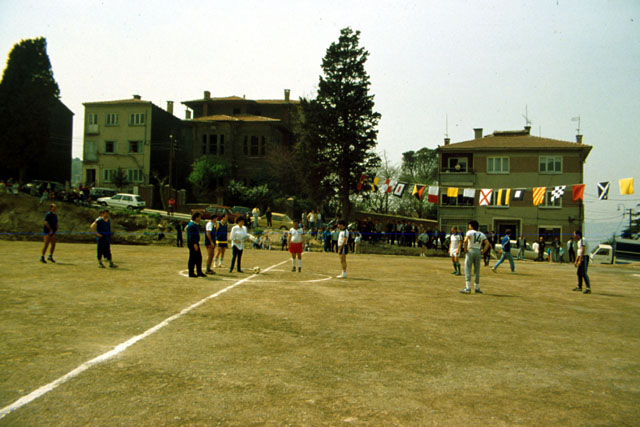 Exterior view showing housing encircling football pitch