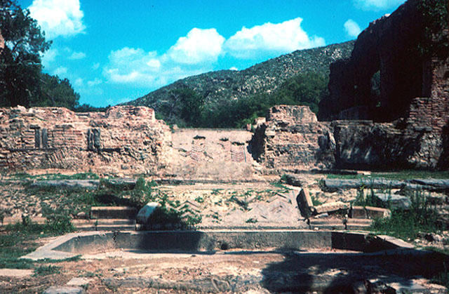 Exterior detail of ruins and dried up pool foundation, showing chadar (sloping surface)