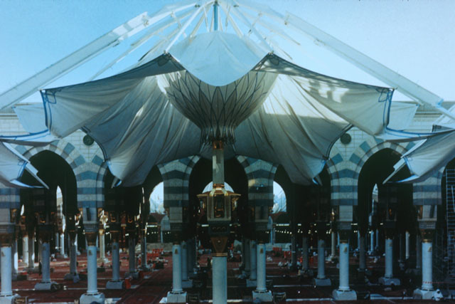 Interior view showing umbrella tent closing over courtyard