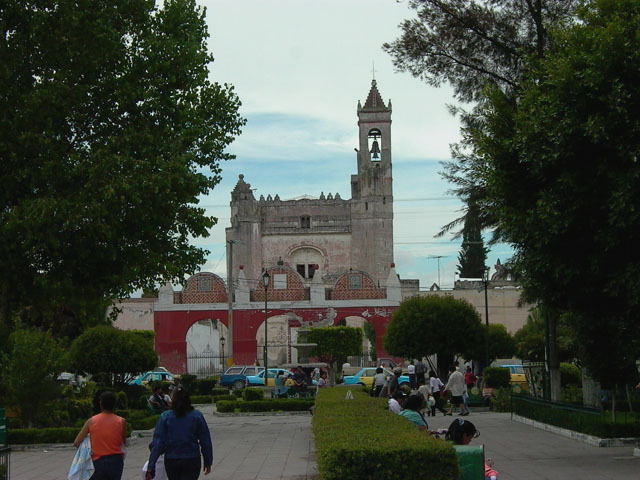 Exterior view from plaza with the church and campanile beyond