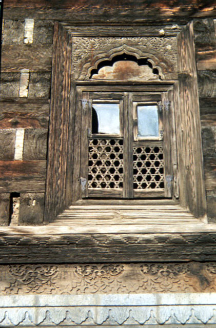 Detail of window showing changes and additions over time
