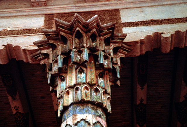 Muqarnas carved wooden capital at the High Mosque portico