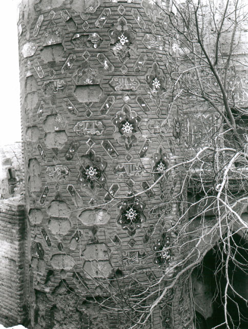 Exterior detail, tile ornament at minaret base