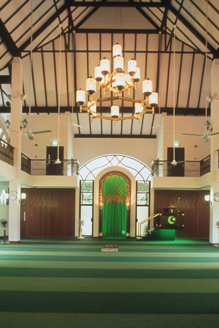 Interior view showing prayer hall with tall pitched ceiling