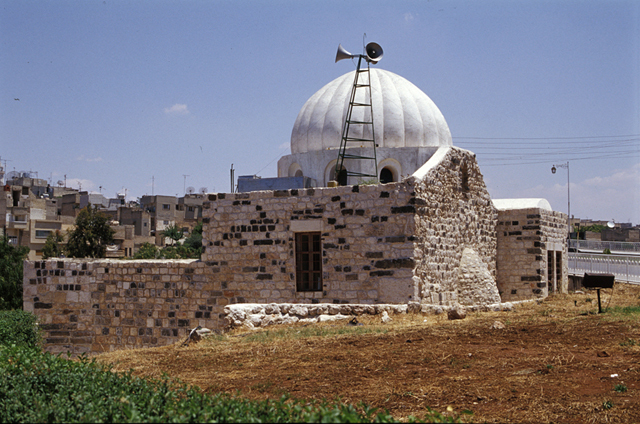Exterior view from west-southwest. Mihrab apse is seen on qibla wall