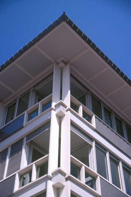 Exterior detail showing corner balcony