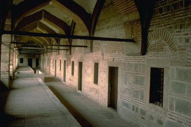 <p>A covered gallery on the second floor surrounds the courtyard on all four sides</p>