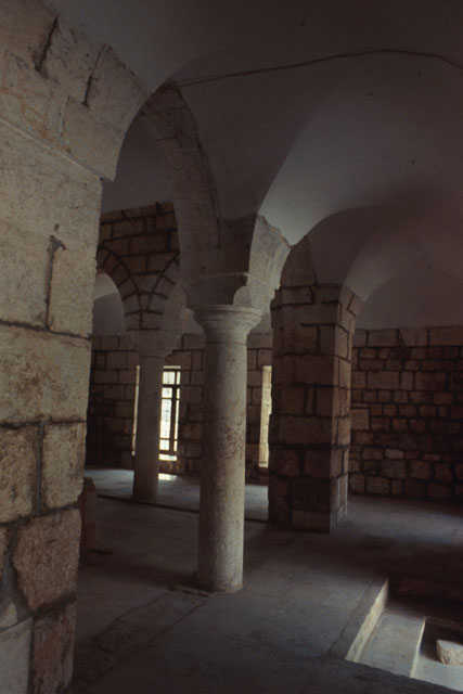 Interior view showing stone pillars and structural columns
