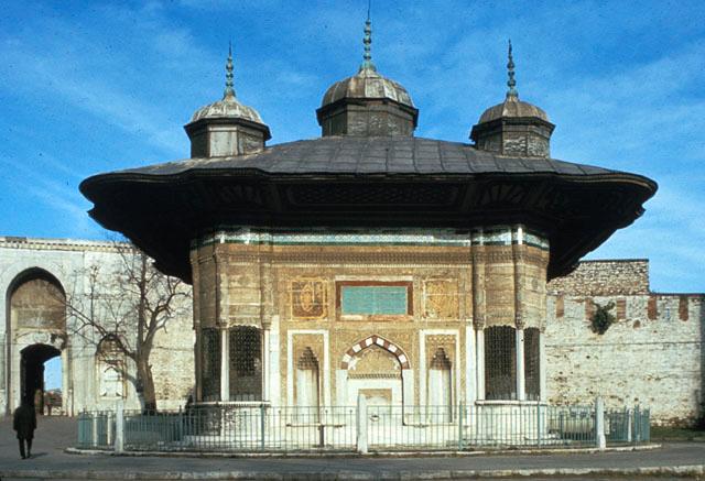 The Imperial Gate - View from southwest, with the outer walls of the Topkapi Palace and Imperial Gate (Bab-i Hümayun) seen in the background