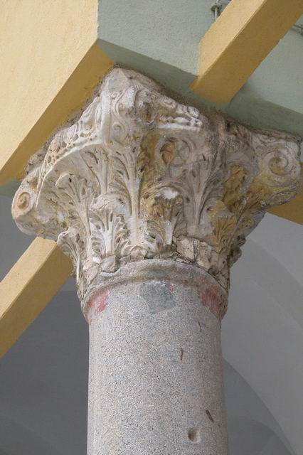 Detail of a Corinthian column capital in the courtyard