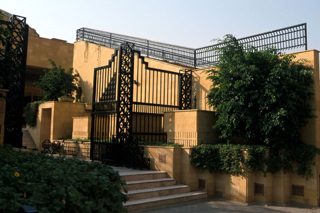 Exterior view showing elaborate iron gateway