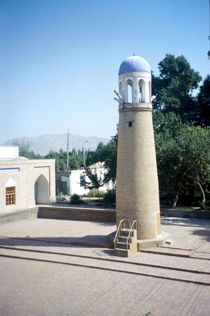 Detail of minaret, with tiled domical cap