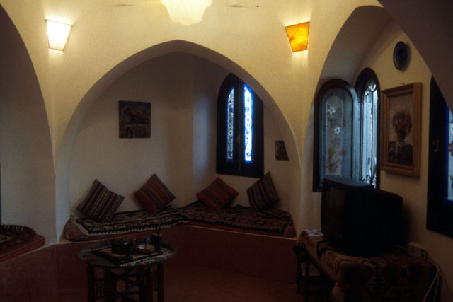 Interior view showing divans set under archways