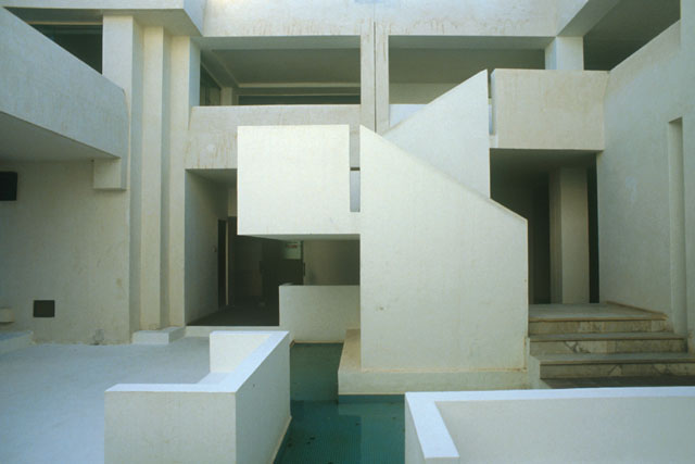 Exterior view showing placement of forms around reflecting pools